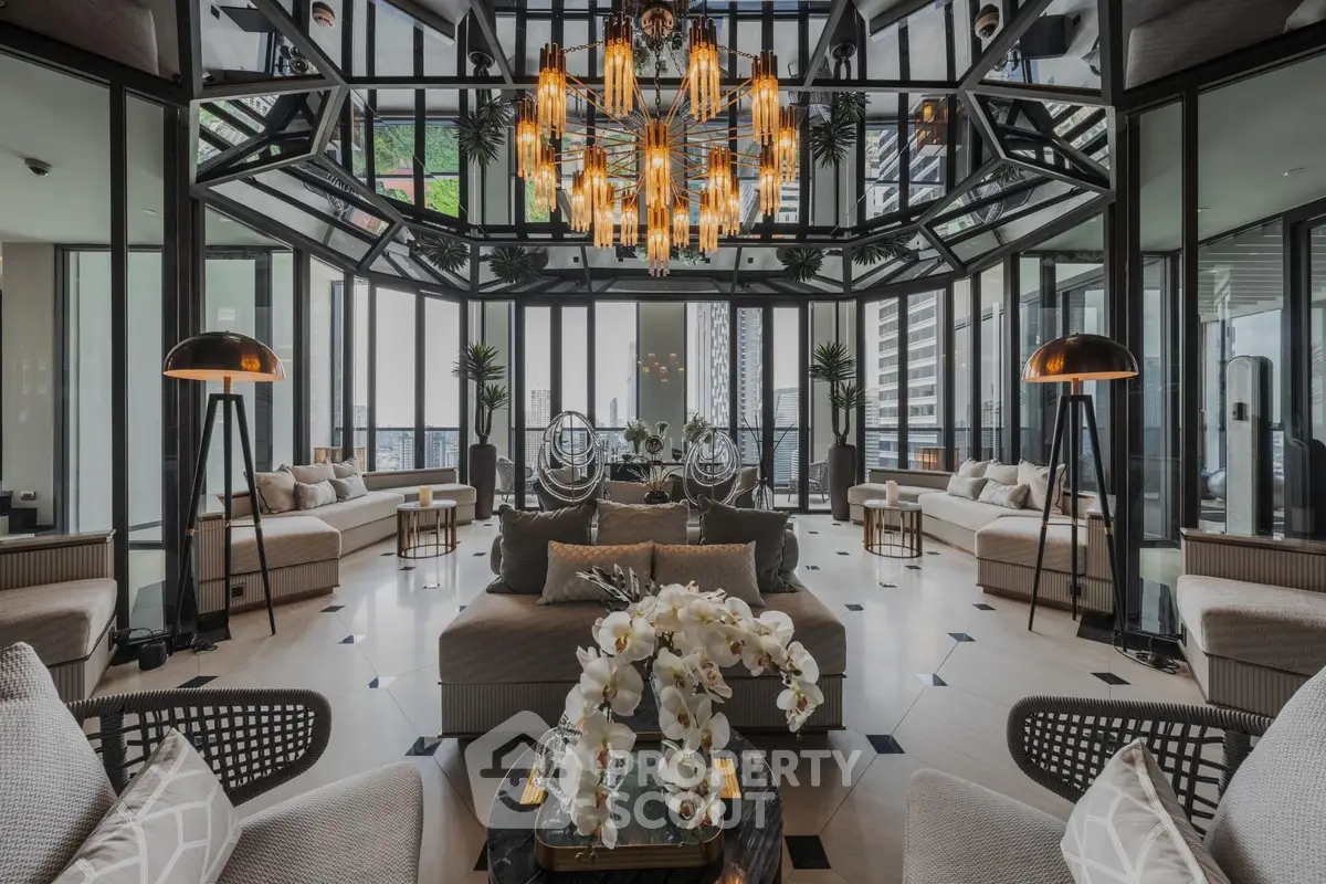 Luxurious penthouse living room with panoramic city views and elegant chandelier