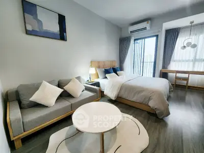 Modern studio apartment with cozy bed and stylish decor