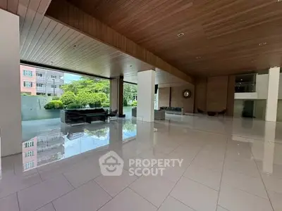 Spacious modern building lobby with sleek design and natural light