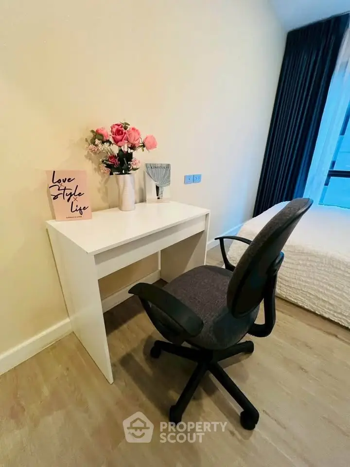 Chic bedroom corner with stylish desk and chair, perfect for a cozy home office setup.