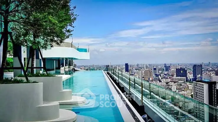 Luxurious rooftop infinity pool with stunning city skyline view