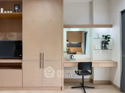 Modern study area with sleek wooden cabinetry and stylish chair