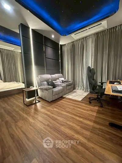 Luxurious modern living room with starry ceiling and elegant furnishings