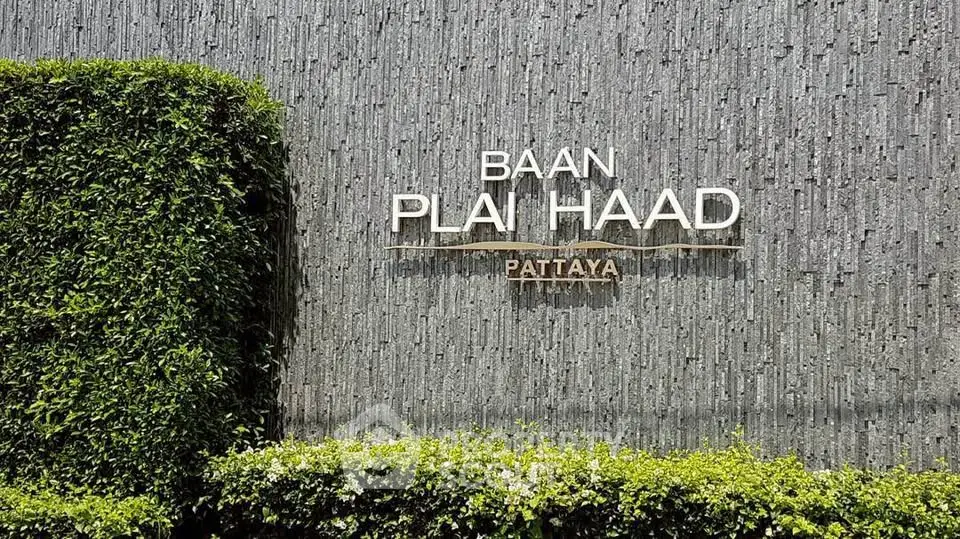 Elegant exterior of Baan Plai Haad Pattaya with lush greenery and modern design.