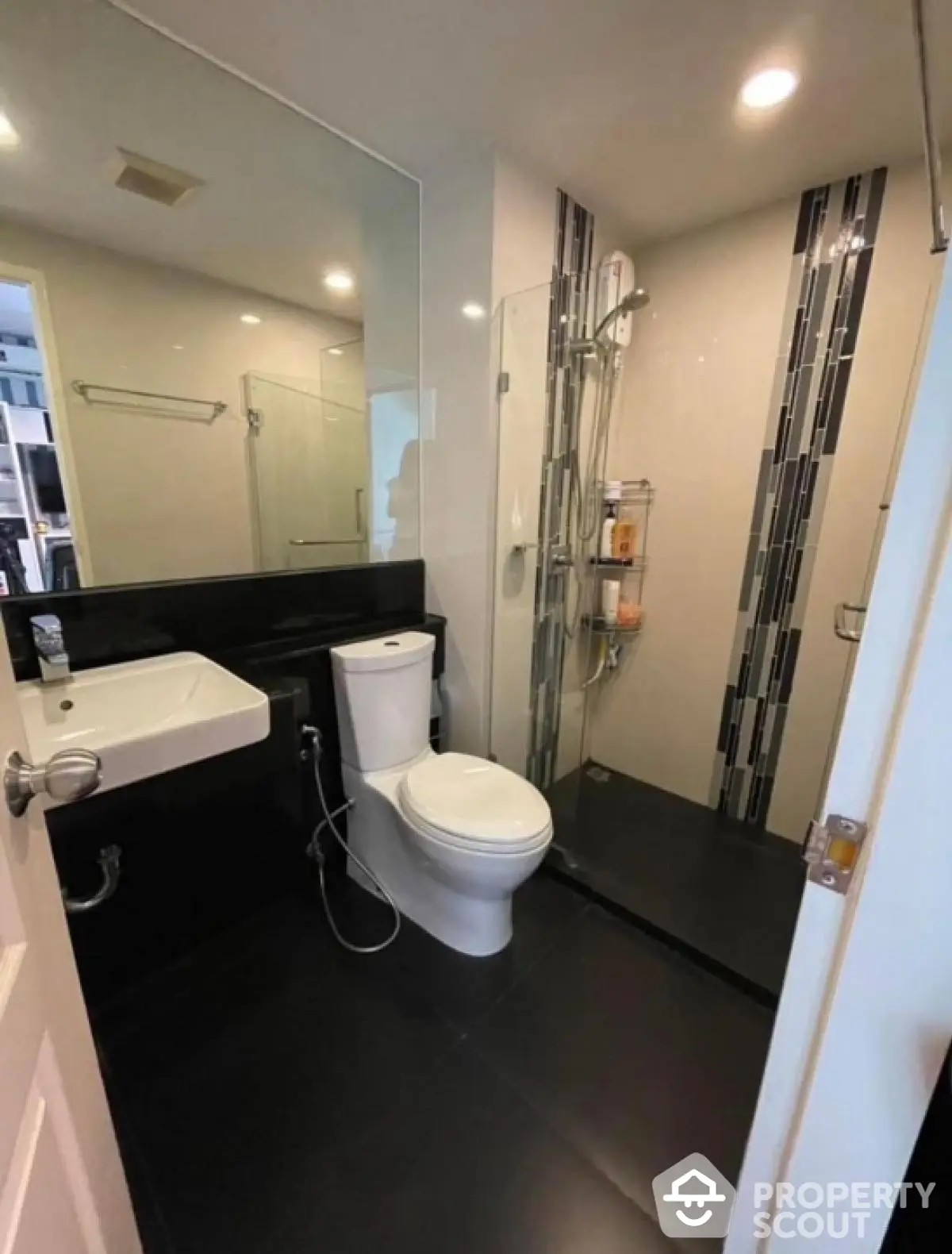 Modern bathroom with sleek design and glass shower enclosure