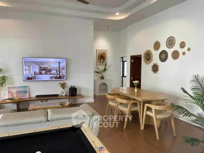 Spacious modern living room with stylish decor and wooden furniture
