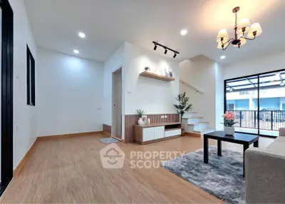 Spacious modern living room with elegant decor and natural light