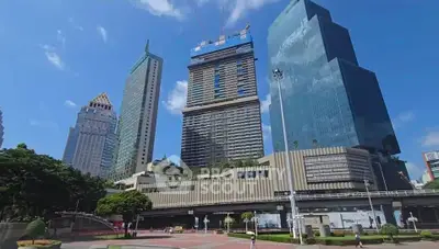 Stunning urban skyline with modern skyscrapers and lush greenery, perfect for city living enthusiasts.
