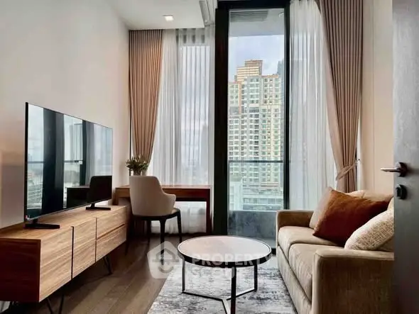 Modern living room with large window and city view, featuring stylish furniture and decor.
