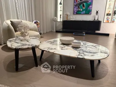 Stylish modern living room with marble coffee tables and elegant decor