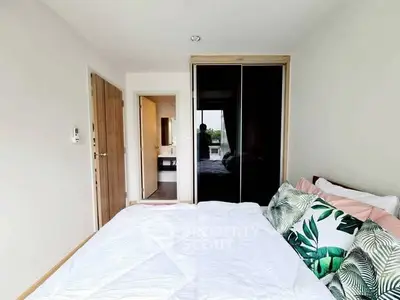 Cozy bedroom with modern decor and large wardrobe