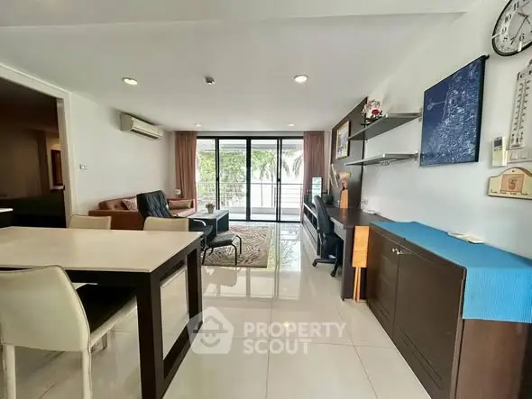 Spacious modern living room with balcony and stylish decor
