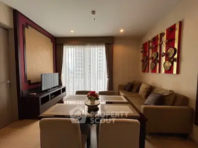 Elegant living room with modern decor and large window view