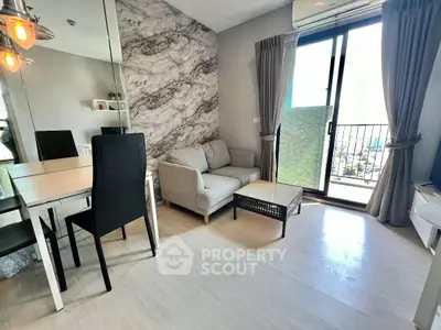 Modern living room with marble accent wall and balcony access