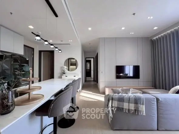 Modern living room with sleek design, open layout, and stylish furniture, perfect for contemporary living.