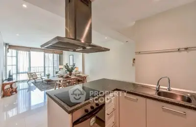 Modern open kitchen with sleek design and spacious dining area