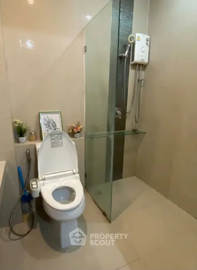 Modern bathroom with glass shower and stylish decor