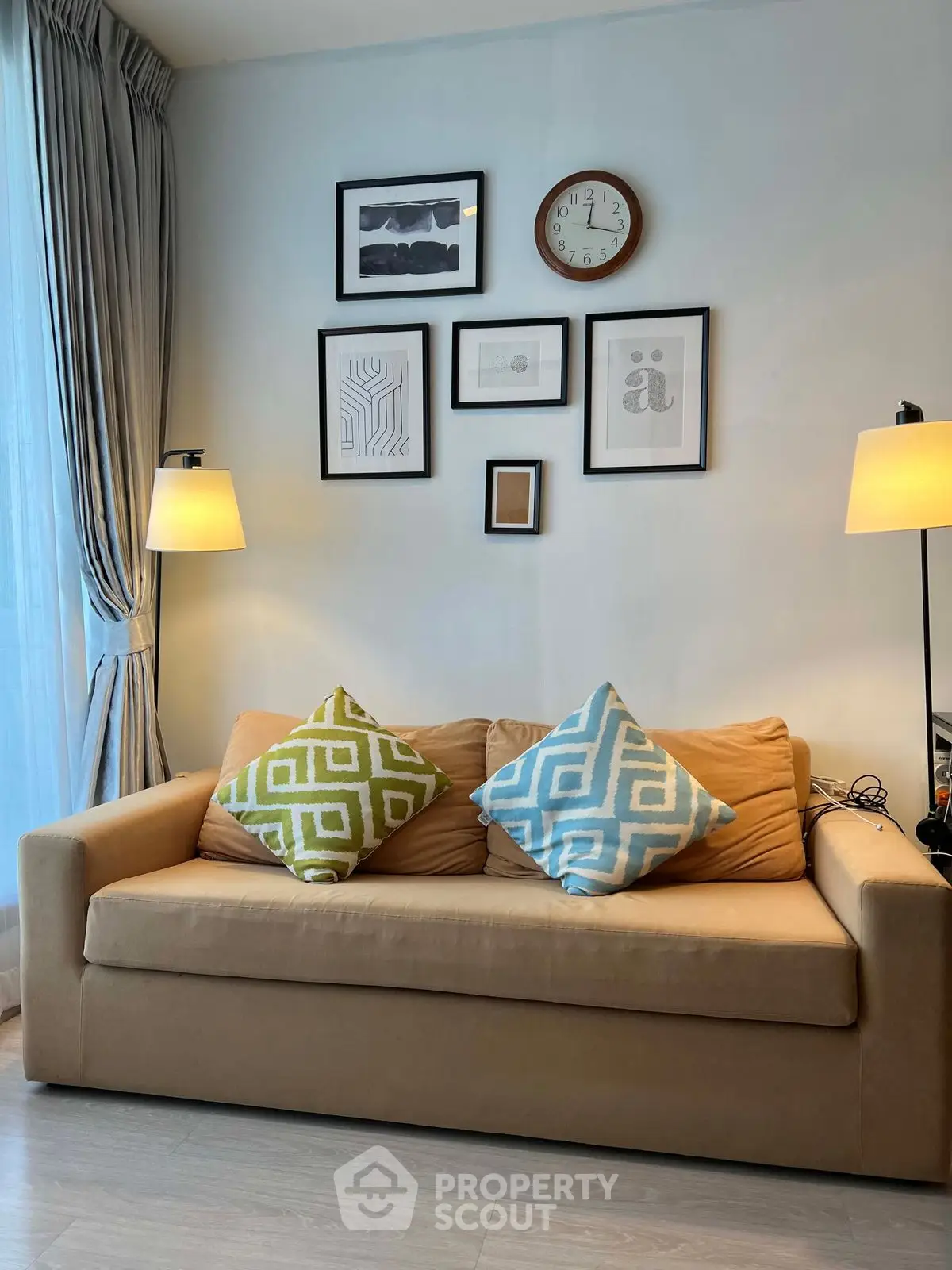 Cozy living room with stylish sofa and decorative wall art