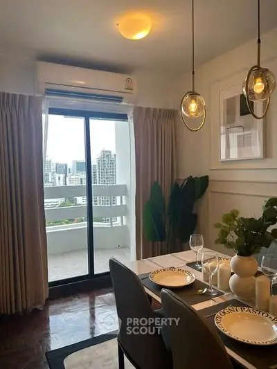 Stylish dining area with balcony view in modern apartment