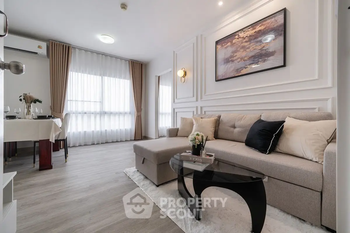 Elegant living room with modern decor and cozy seating area