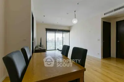 Spacious dining area with city view in modern apartment