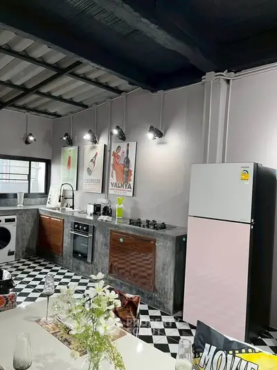 Stylish industrial kitchen with modern appliances and chic decor