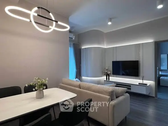 Modern living room with stylish lighting and sleek furniture design