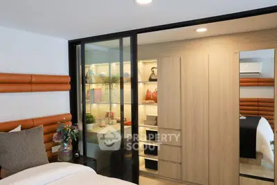 Modern bedroom with stylish storage and cozy decor