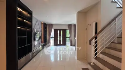 Spacious modern living room with sleek design and natural light