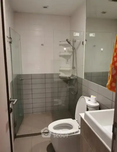 Modern bathroom with glass shower and sleek fixtures