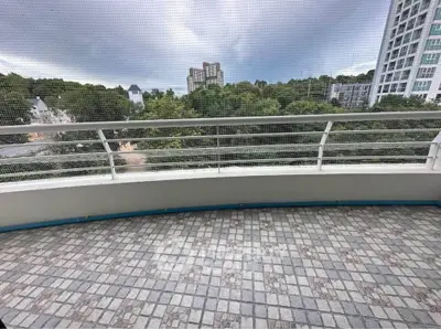 Spacious balcony with scenic view in modern apartment building