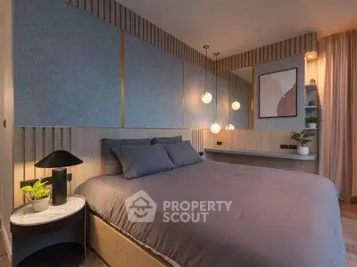 Luxurious modern bedroom with stylish decor and ambient lighting