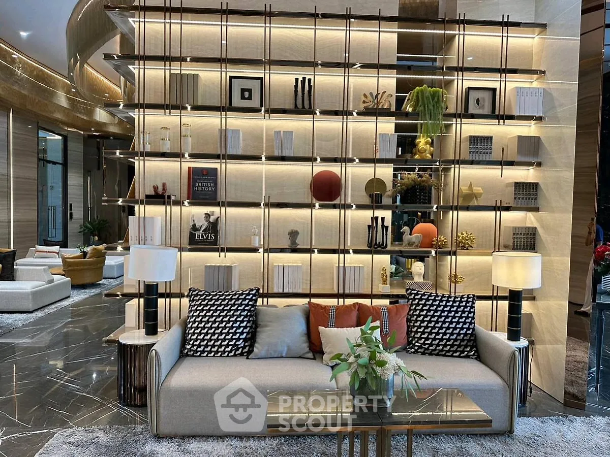 Luxurious modern living room with elegant decor and stylish shelving unit.