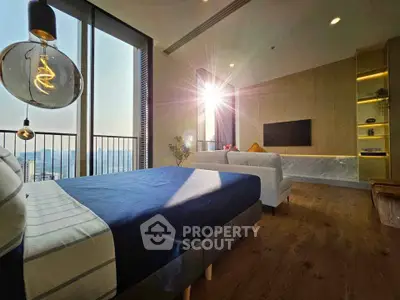 Luxurious bedroom with stunning view and modern decor, featuring a cozy bed and elegant lighting.