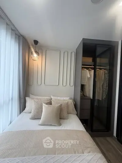 Modern bedroom with stylish decor and built-in wardrobe