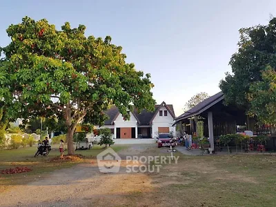 Charming countryside property with spacious garden and traditional architecture, perfect for serene living.