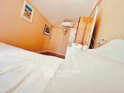 Cozy bedroom with air conditioning and stylish decor