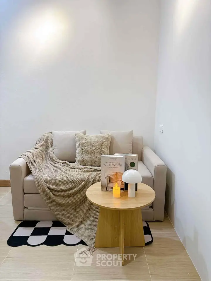 Cozy living room corner with stylish sofa and modern decor