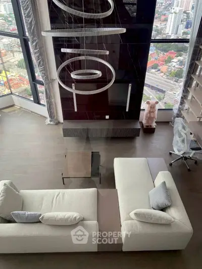 Luxurious high-rise living room with stunning city view and modern decor