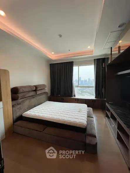 Luxurious bedroom with city view and modern design