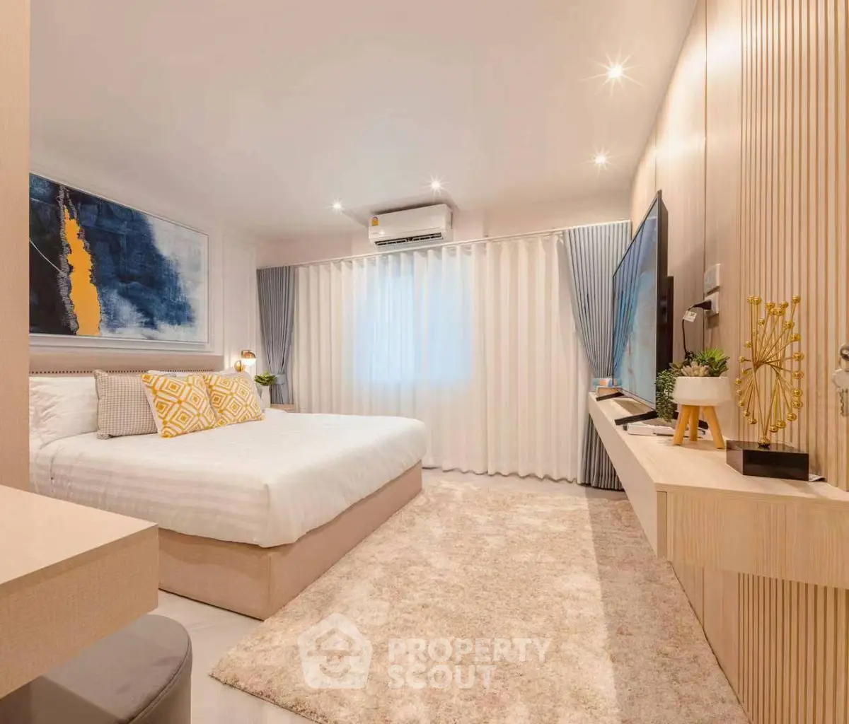 Luxurious modern bedroom with stylish decor and cozy ambiance