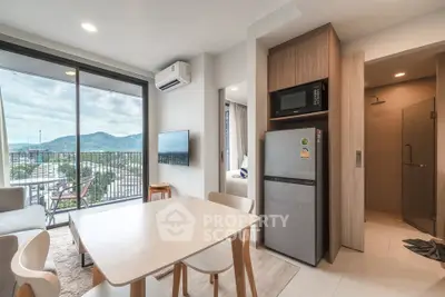 Modern apartment interior with dining area and balcony view