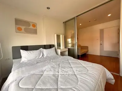 Modern bedroom with cozy bed and stylish decor in a bright apartment
