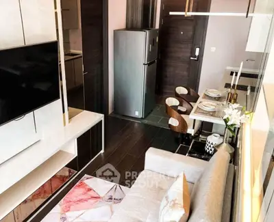 Modern living room with open kitchen and stylish decor