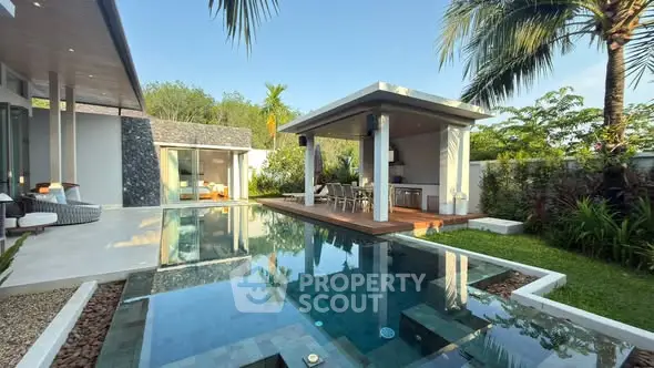 Luxurious modern villa with private pool and lush garden, perfect for tropical living.