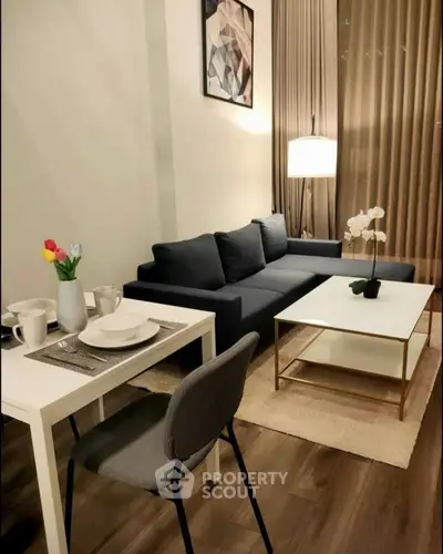 Modern living room with stylish decor and cozy dining area