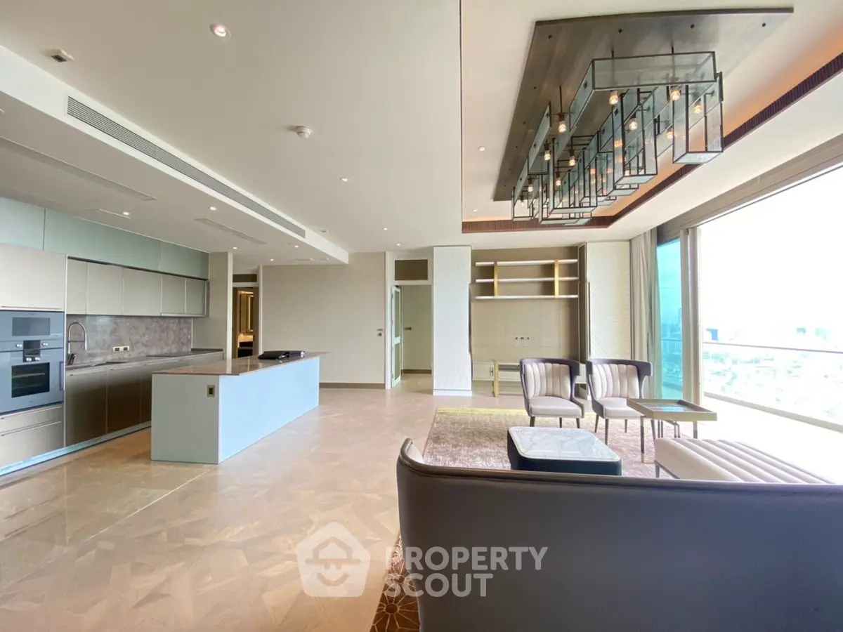 Luxurious open-layout living room with modern kitchen and stunning city view.