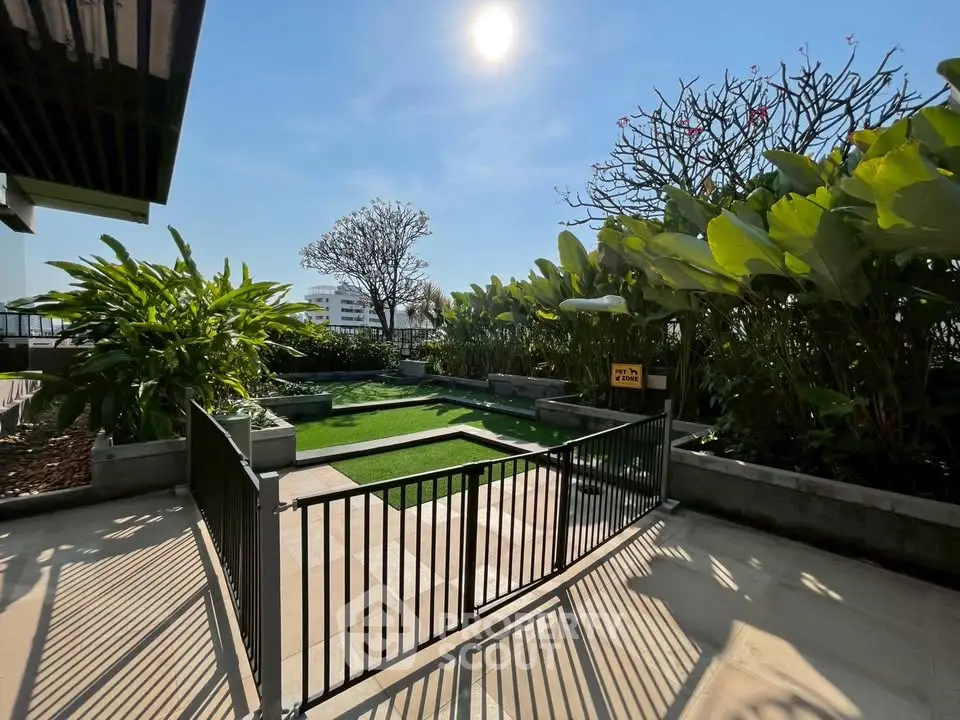 Stunning rooftop garden with lush greenery and open sky view, perfect for relaxation and outdoor activities.