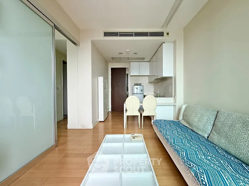 Modern living room with open kitchen and stylish decor