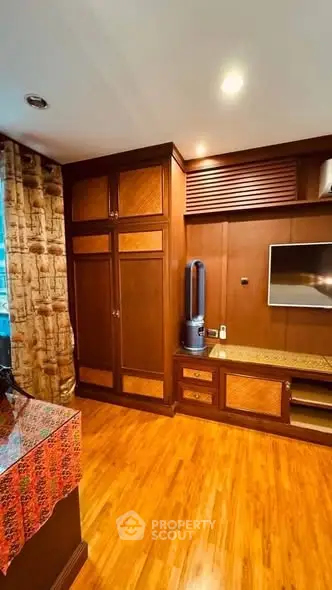 Elegant wooden interior with built-in cabinets and modern decor